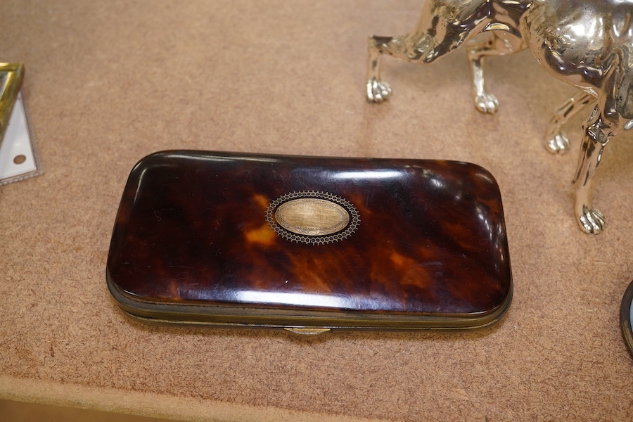 An enamelled silver plated model of a hound, tortoiseshell cigar case and watercolour miniature of a lady, largest 14cm wide. Condition - fair to good